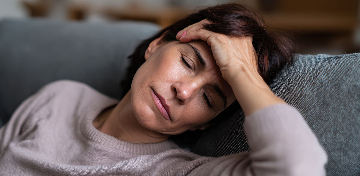 Physical Healthcare of Jacksonville provider evaluating a patient's upper cervical spine and atlas misalignment as part of a whole-body treatment approach