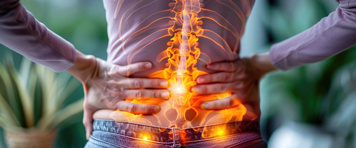 Patient undergoing spinal decompression therapy for sciatica-related lower back and leg pain.
